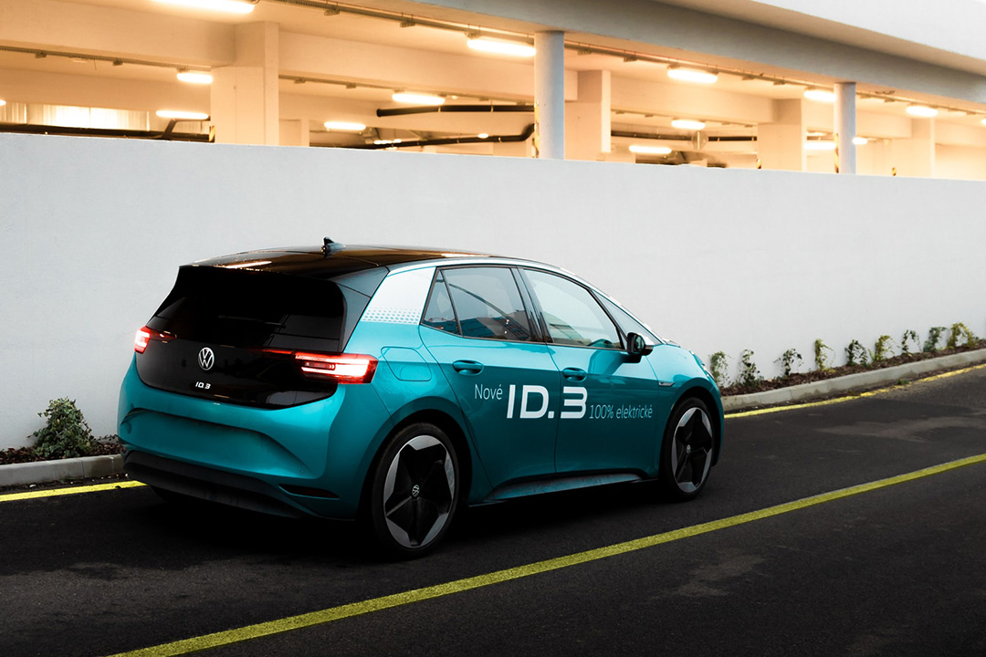 A blue VW ID.3 EV driving on a street